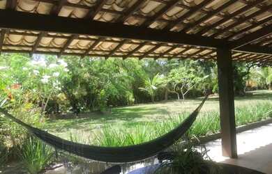 Imagem: A casa possui 3 Dormitórios, 3 Banheiros, 5 Vagas na garagem