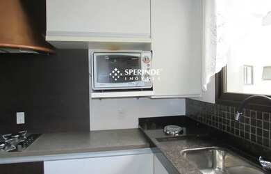 Imagem: O apartamento possui 3 Dormitórios, 1 Banheiro, 2 Vagas na