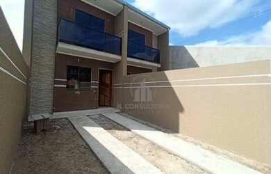 Imagem: A casa possui 3 Dormitórios, 1 Banheiro, 2 Vagas na garagem