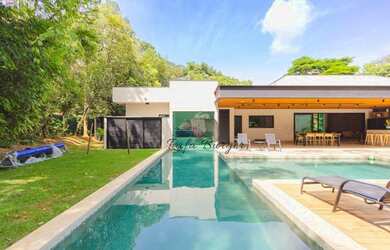 Imagem: A casa em condomínio possui 4 Dormitórios, 5 Banheiros, 5