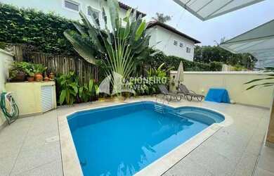 Imagem: A casa em condomínio possui 4 Dormitórios, 5 Banheiros, 4