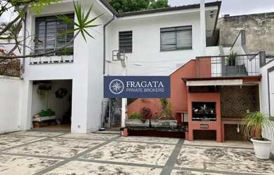 Imagem: A casa possui 5 Dormitórios, 5 Banheiros, 5 Vagas na garagem