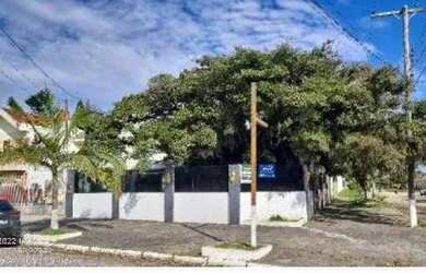 Imagem: A casa possui 3 Dormitórios, 1 Banheiro, 1 Vaga na garagem