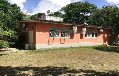 Imagem: A casa possui 5 Dormitórios, 4 Banheiros, 2 Vagas na garagem