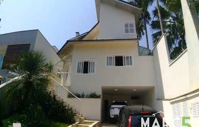 Imagem: A casa em condomínio possui 4 Dormitórios, 5 Banheiros, 4