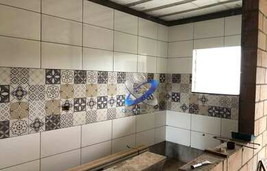 Imagem: A casa possui 2 Dormitórios, 1 Banheiro, 2 Vagas na garagem