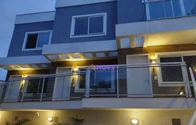 Imagem: A casa possui 2 Dormitórios, 3 Banheiros, 1 Vaga na garagem