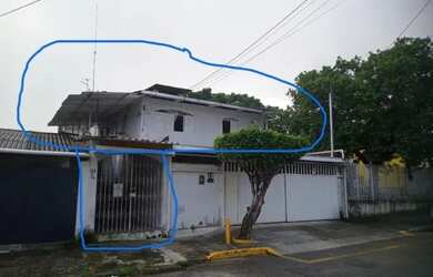 Imagem: A casa possui 2 Dormitórios, 2 Banheiros e está localizado