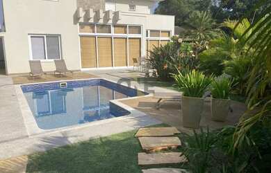 Imagem: A casa em condomínio à venda possui 4 Dormitórios, 4 Banheiros