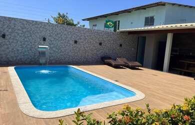 Imagem 9: Melhor casa de temporada. Acomodam 12 pessoas, 1 Vaga na garageme4 Dormitórios