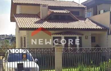 Imagem: A casa possui 4 Dormitórios, 5 Banheiros, 5 Vagas na garagem