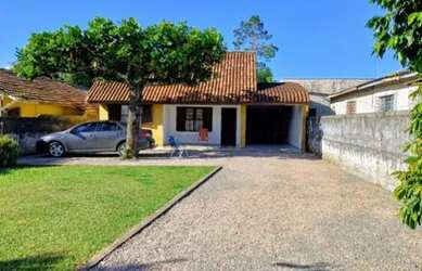 Imagem: A casa possui 5 Dormitórios, 2 Banheiros, 5 Vagas na garagem