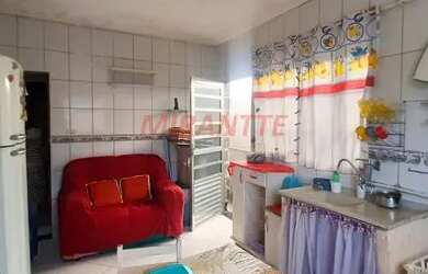 Imagem: A casa possui 2 Dormitórios, 2 Banheiros, 2 Vagas na garagem