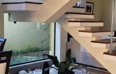 Imagem: A casa em condomínio possui 4 Dormitórios, 4 Banheiros, 4