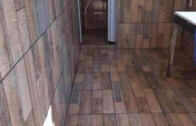 Imagem: A casa possui 2 Dormitórios, 3 Banheiros, 5 Vagas na garagem