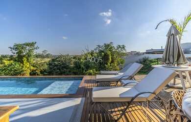 Imagem: A casa em condomínio possui 4 Dormitórios, 5 Banheiros, 2