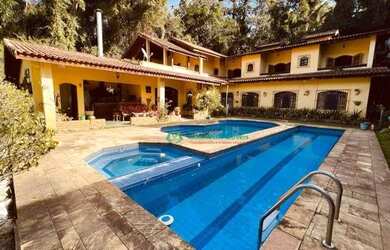 Imagem: A casa em condomínio possui 4 Dormitórios, 5 Banheiros, 5