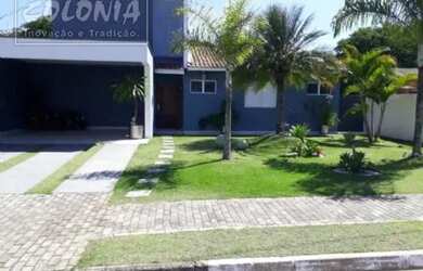 Imagem: A casa possui 3 Dormitórios, 2 Banheiros, 4 Vagas na garagem