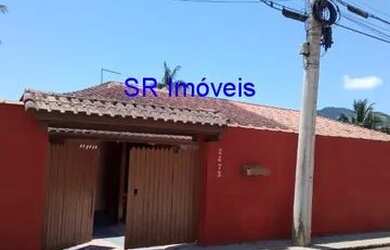 Imagem: A casa possui 2 Dormitórios, 1 Banheiro, 2 Vagas na garagem