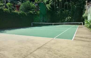 Imagem: A casa possui 5 Dormitórios, 5 Banheiros, 4 Vagas na garagem