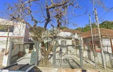 Imagem: A casa possui 3 Dormitórios, 2 Banheiros, 1 Vaga na garagem