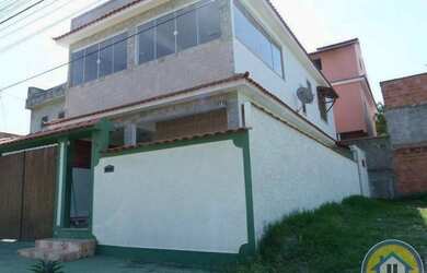 Imagem: A casa possui 3 Dormitórios, 3 Banheiros, 1 Vaga na garagem