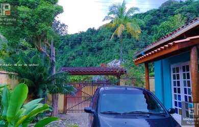 Imagem: A casa à venda possui 3 Dormitórios, 1 Banheiro, 2 Vagas na