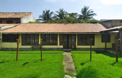 Imagem: A casa possui 3 Dormitórios, 2 Banheiros, 3 Vagas na garagem