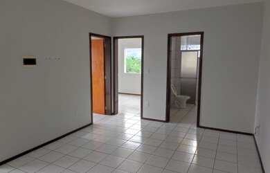 Imagem: O apartamento possui 2 Dormitórios, 1 Banheiro, 1 Vaga na garagem