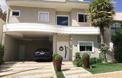 Imagem: A casa em condomínio possui 4 Dormitórios, 5 Banheiros, 4