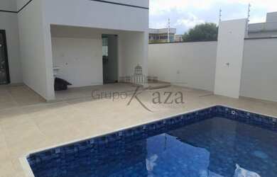 Imagem: A casa possui 3 Dormitórios, 4 Banheiros, 4 Vagas na garagem