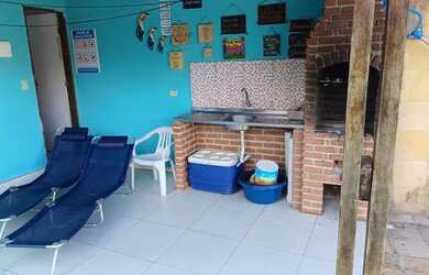 Imagem: A casa possui 4 Dormitórios e 3 Vagas na garagem e está localizado