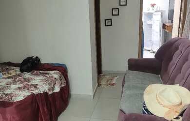 Imagem: A casa possui 2 Dormitórios, Acomodam 8 pessoas, 1 Vaga na