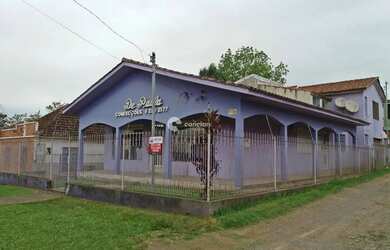 Imagem: A casa possui 3 Dormitórios, 3 Banheiros, 3 Vagas na garagem