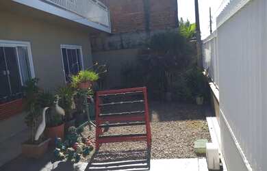 Imagem: A casa possui 5 Dormitórios, 3 Banheiros, 5 Vagas na garagem