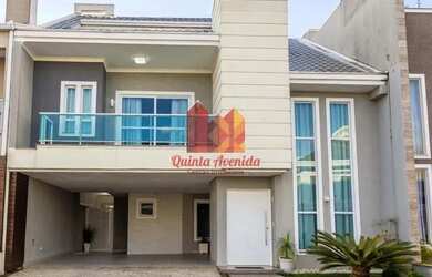 Imagem: A casa possui 4 Dormitórios, 4 Banheiros, 4 Vagas na garagem