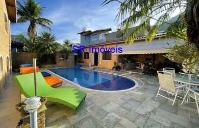 Imagem: A casa em condomínio possui 5 Dormitórios, 5 Banheiros, 3