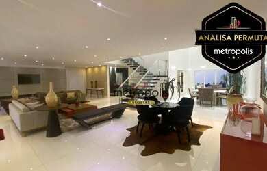 Imagem: A casa possui 4 Dormitórios, 5 Banheiros, 5 Vagas na garagem