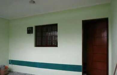 Imagem: A casa possui 3 Dormitórios, 2 Banheiros, 2 Vagas na garagem