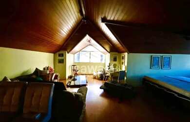 Imagem: A casa possui 4 Dormitórios, 5 Banheiros, 2 Vagas na garagem