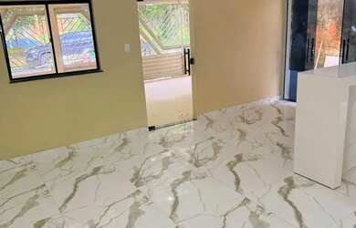 Imagem: A casa possui 3 Dormitórios, 3 Banheiros, 2 Vagas na garagem