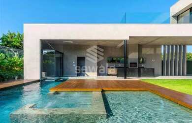 Imagem: A casa possui 4 Dormitórios, 4 Banheiros, 3 Vagas na garagem