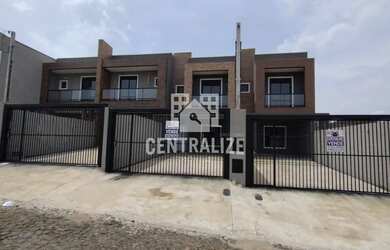 Imagem: A casa possui 3 Dormitórios, 1 Banheiro, 2 Vagas na garagem