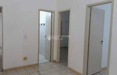 Imagem: A casa possui 2 Dormitórios, 1 Banheiro, 1 Vaga na garagem