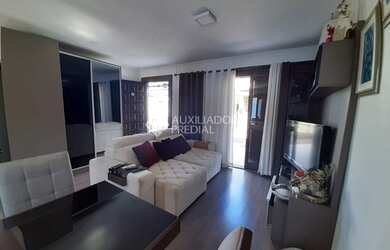 Imagem: A casa possui 3 Dormitórios, 1 Banheiro, 1 Vaga na garagem