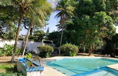 Imagem: A casa em condomínio possui 5 Dormitórios, 5 Banheiros, 5