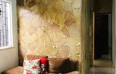 Imagem: A casa possui 2 Dormitórios, 3 Banheiros, 4 Vagas na garagem