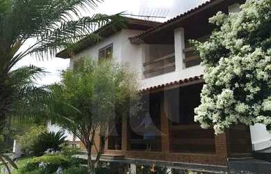 Imagem: A casa possui 3 Dormitórios, 3 Banheiros, 3 Vagas na garagem