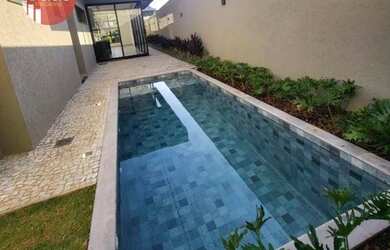 Imagem: A casa em condomínio possui 4 Dormitórios, 4 Banheiros, 4