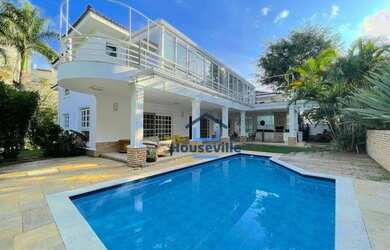 Imagem: A casa em condomínio possui 4 Dormitórios, 5 Banheiros, 5